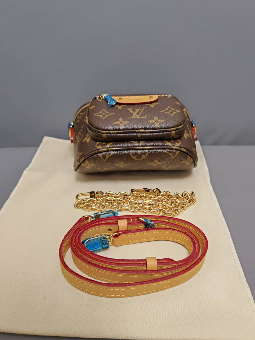 Louis Vuitton Monogram Canvas Mini Crossbody Bag with Chain & Leather Strap